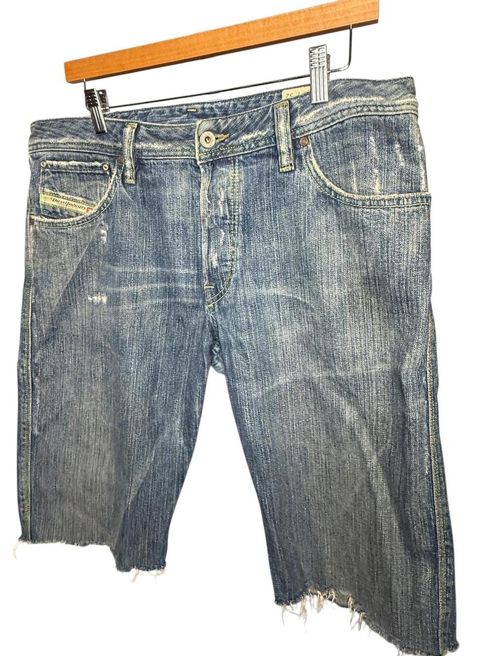 Diesel denim shorts featuring a distressed look with cut-off hem Sz 34